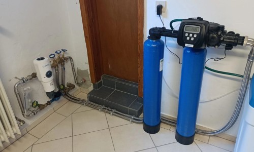 Double water softening system in a single-family home