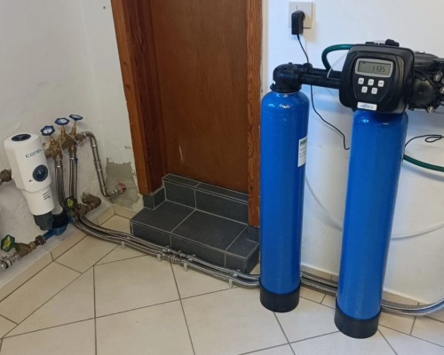 Double water softening system in a single-family home