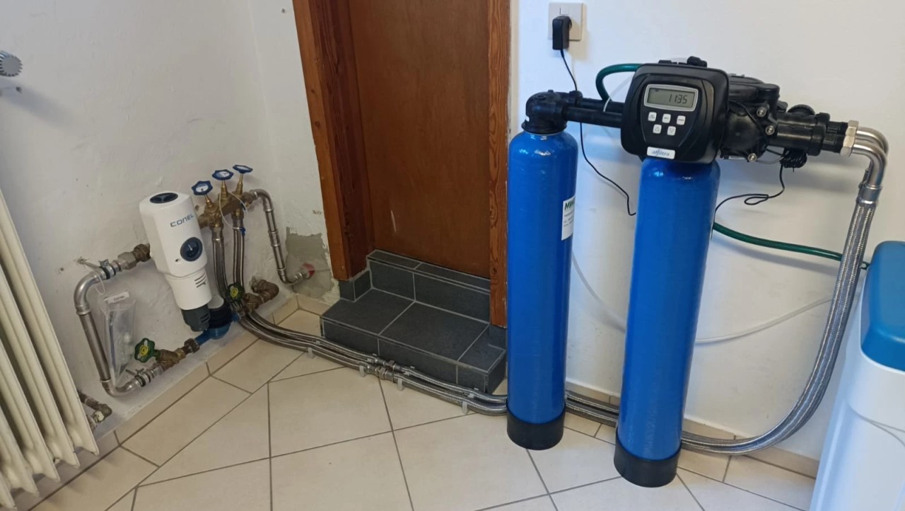 Double water softening system in a single-family home