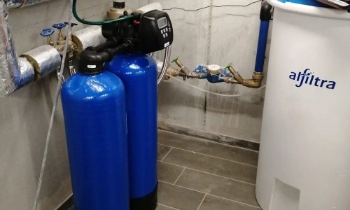 Duplex 120 water softening system in an apartment building