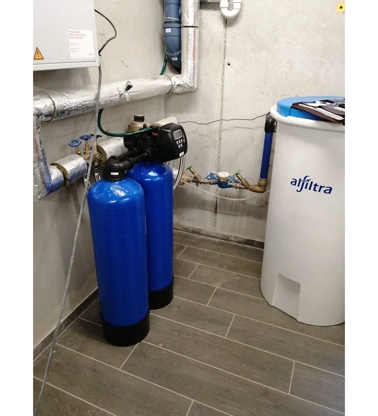 Duplex 120 water softening system in an apartment building