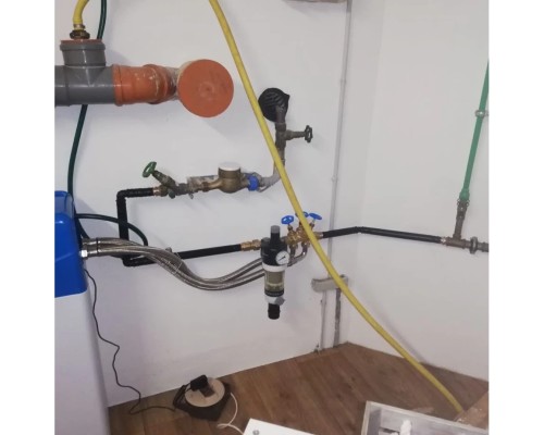 Water softening system house connection