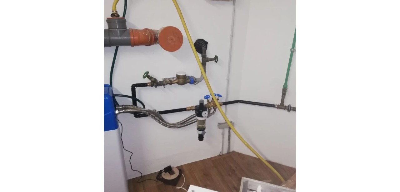 Water softening system house connection